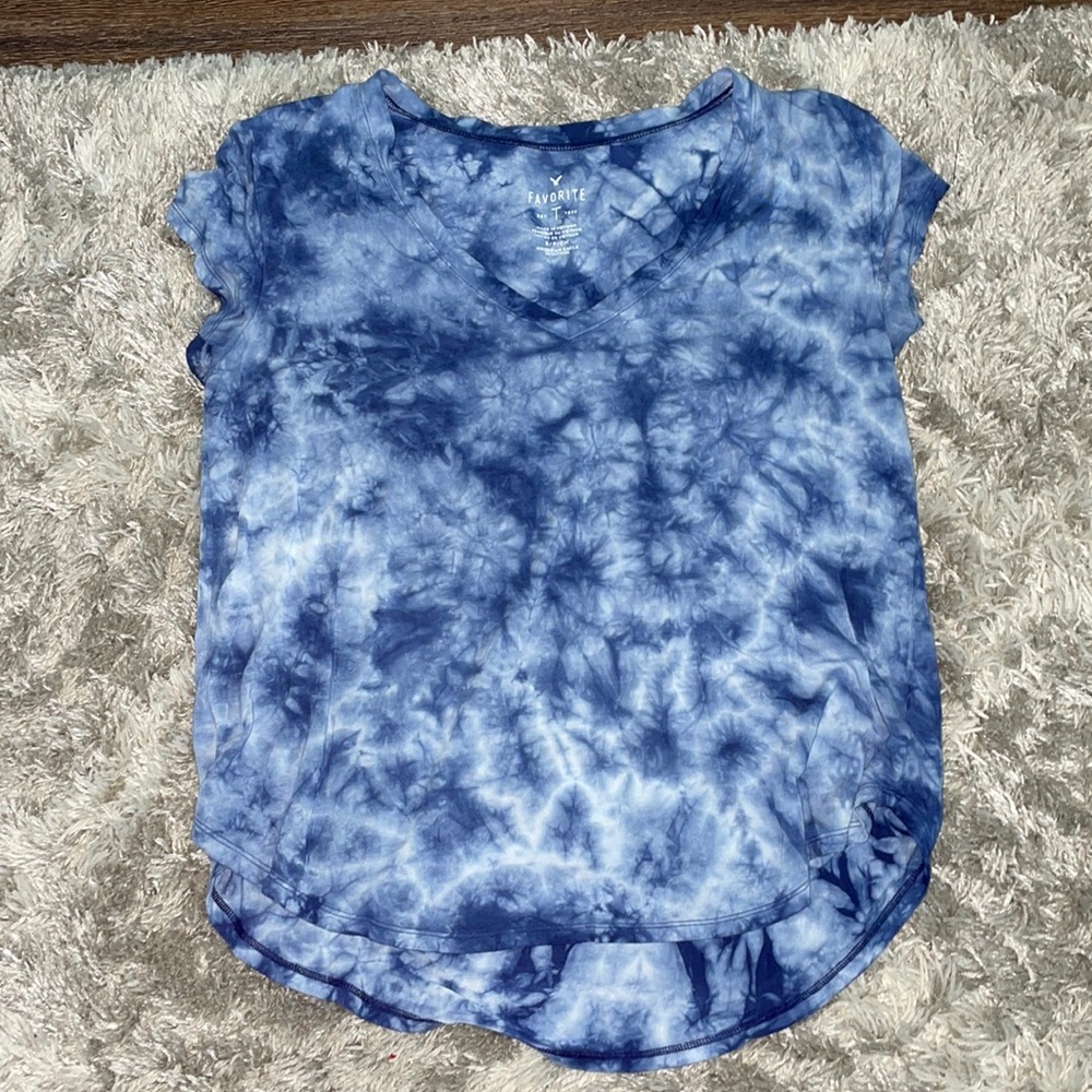 This is a soft and sexy shirt from American Eagle Size Small in a dark blue